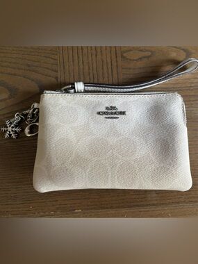 Coach White Pebbled Leather Wristlet with Snowflake Charm